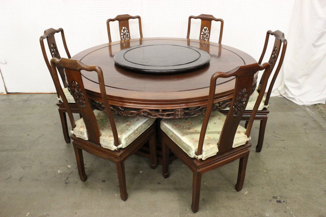 7pc Chinese rosewood dining room set: 7pc Chinese rosewood dining room set; including round table and 6 chairs (30.5"Hx60"dia) and 6 chairs (39.25"Hx16.95"x19.25" each)