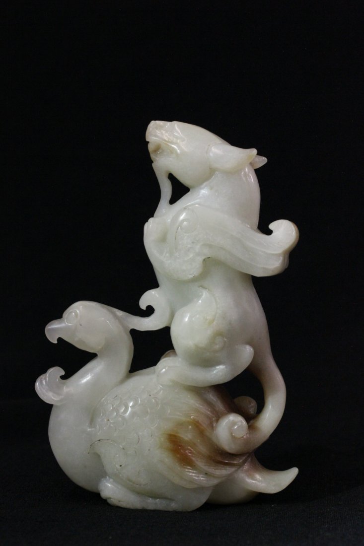 Chinese white jade carving depicting phoenix and qilin (1 of 9)