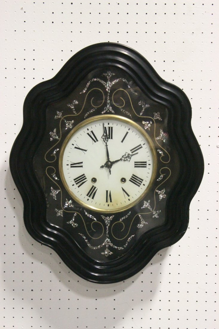 Wall clock with black lacquer wood frame (1 of 8)