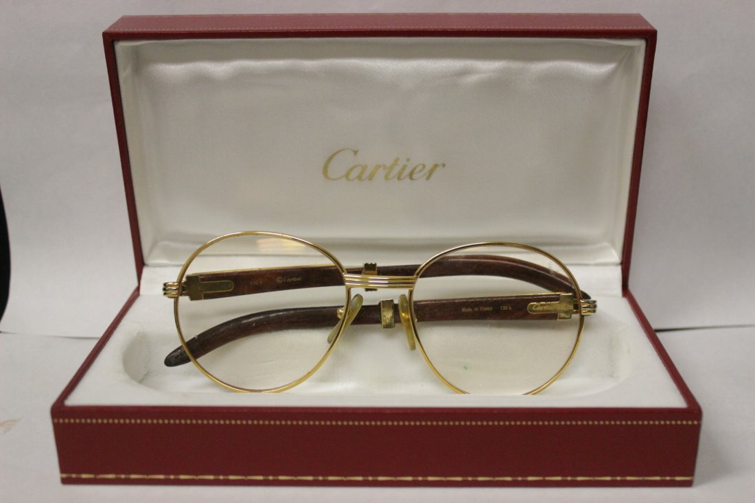 Pair of Cartier glasses in original box: Pair of Cartier glasses in original box