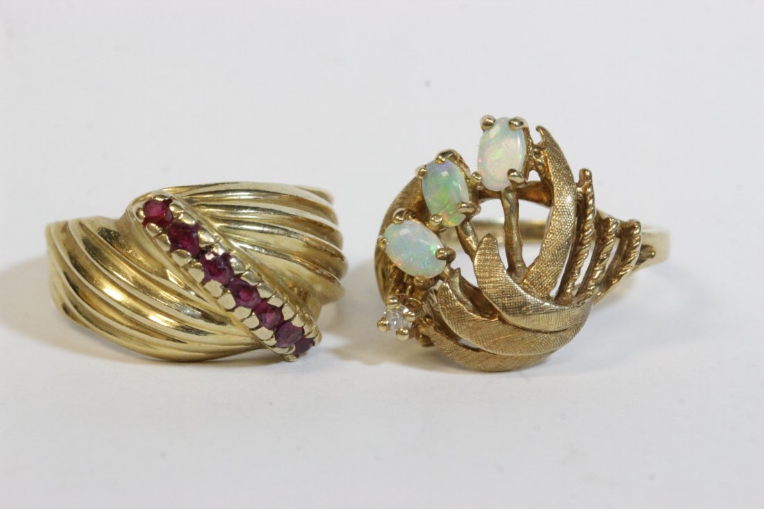 Two 14K Y/G rings: Two 14K Y/G rings; one set with rubies, one with opal and diamonds, wt. 12.0gm, size 5 & 7
