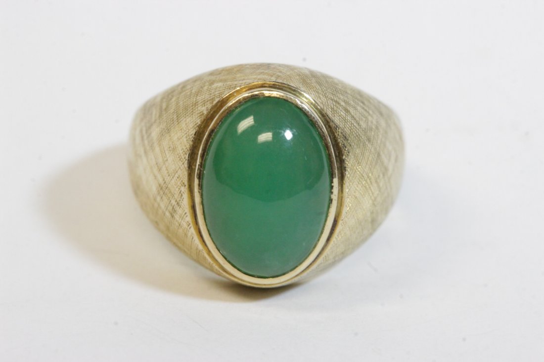 14K Y/G appale green jadeite like ring: 14K Y/G ring, center an apple green jadeite like stone, measures 12x8x4mm, wt. 6.6gm, size 4.5
