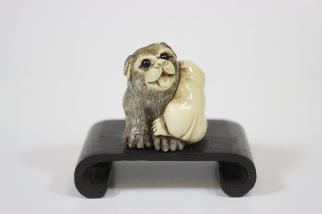 Japanese antique ivory carved netsuke: Japanese antique ivory carved netsuke (1.4"H) depicting 2 dogs , NO INTERNATIONAL SHIPPING OF IVORY