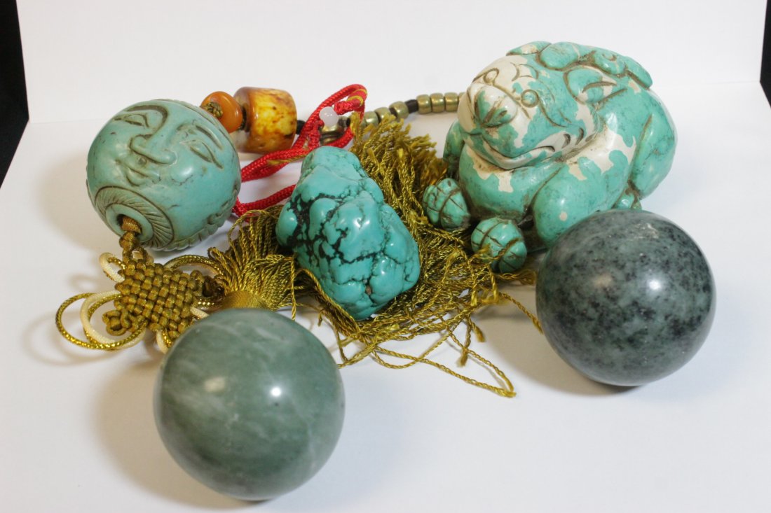 5 pieces: 5 pieces; turquoise like stone carved bear (3.6"x2.5"x2.2"), 2 turquoise stone carved ornaments (2.2"x1.35"x1.35", 1.8"dia), and 2 jade like stone carved balls (1.85"dia, 1.75"dia)
