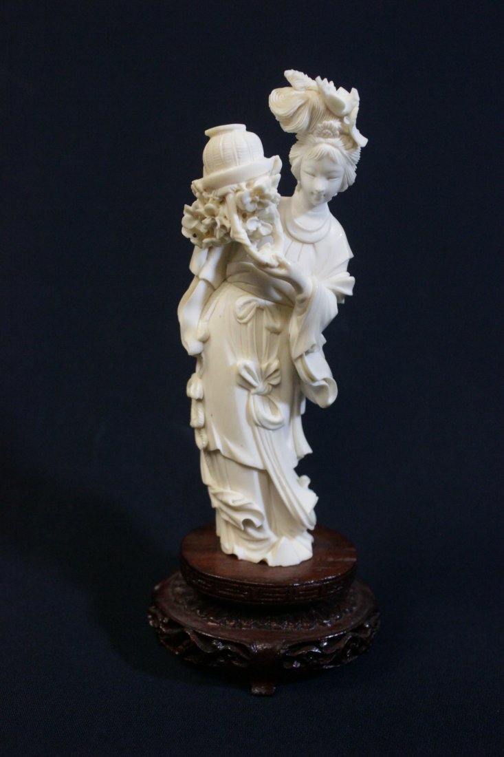 Chinese ivory carved flower lady