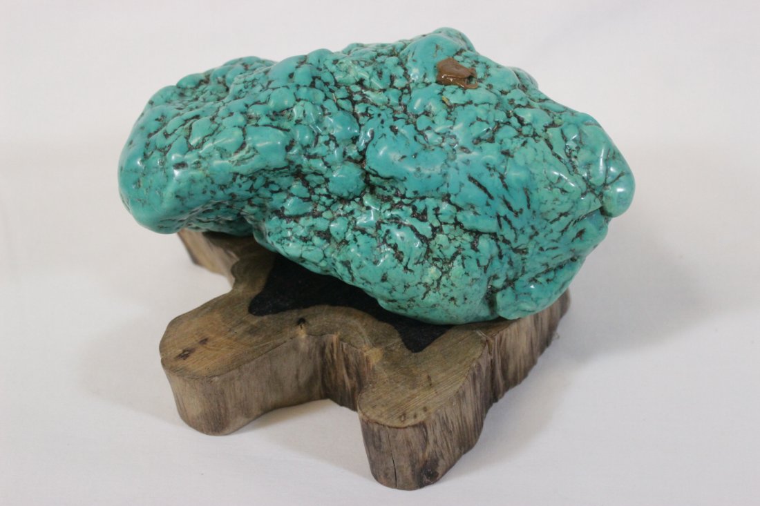 Turquoise like boulder with zitan stand: Turquoise like boulder (3.1"x6.8"x3.8") with zitan stand (1.3"Hx6.5"x6.4")