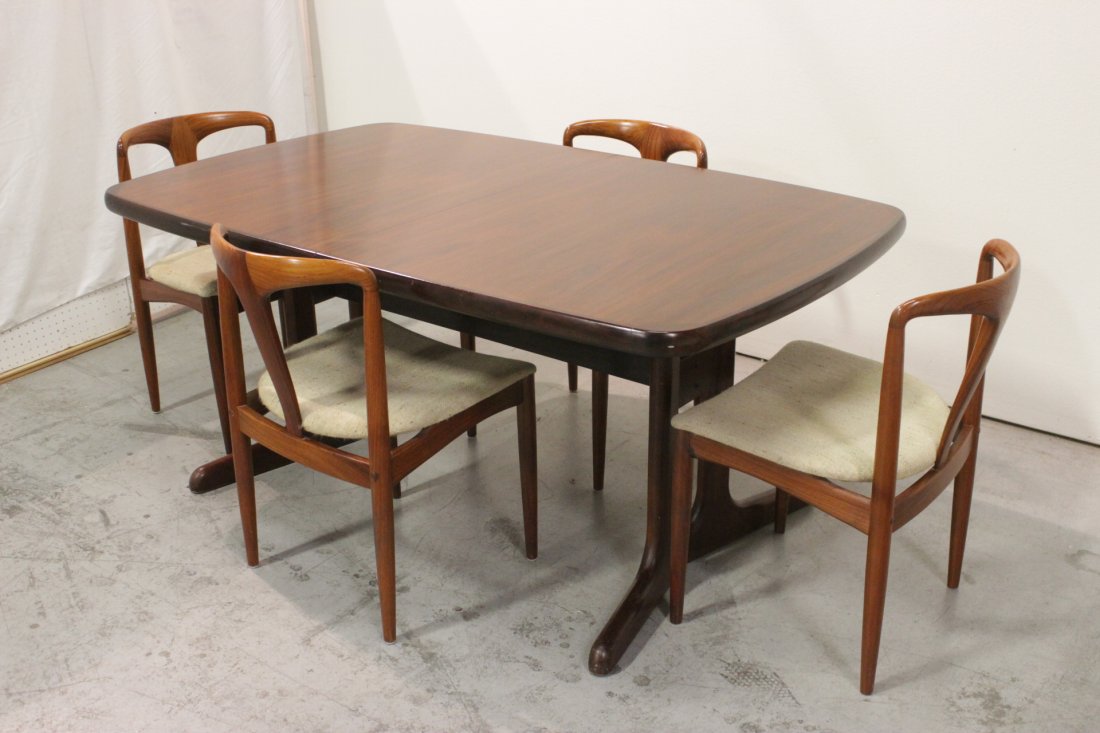 Rosewood Mid century dining room set: Danish modern rosewood dining room table (28.85"Hx65"x39.4") with 4 mid century rosewood dining chairs by D-Scan (30.6"Hx19.4"x21" each)