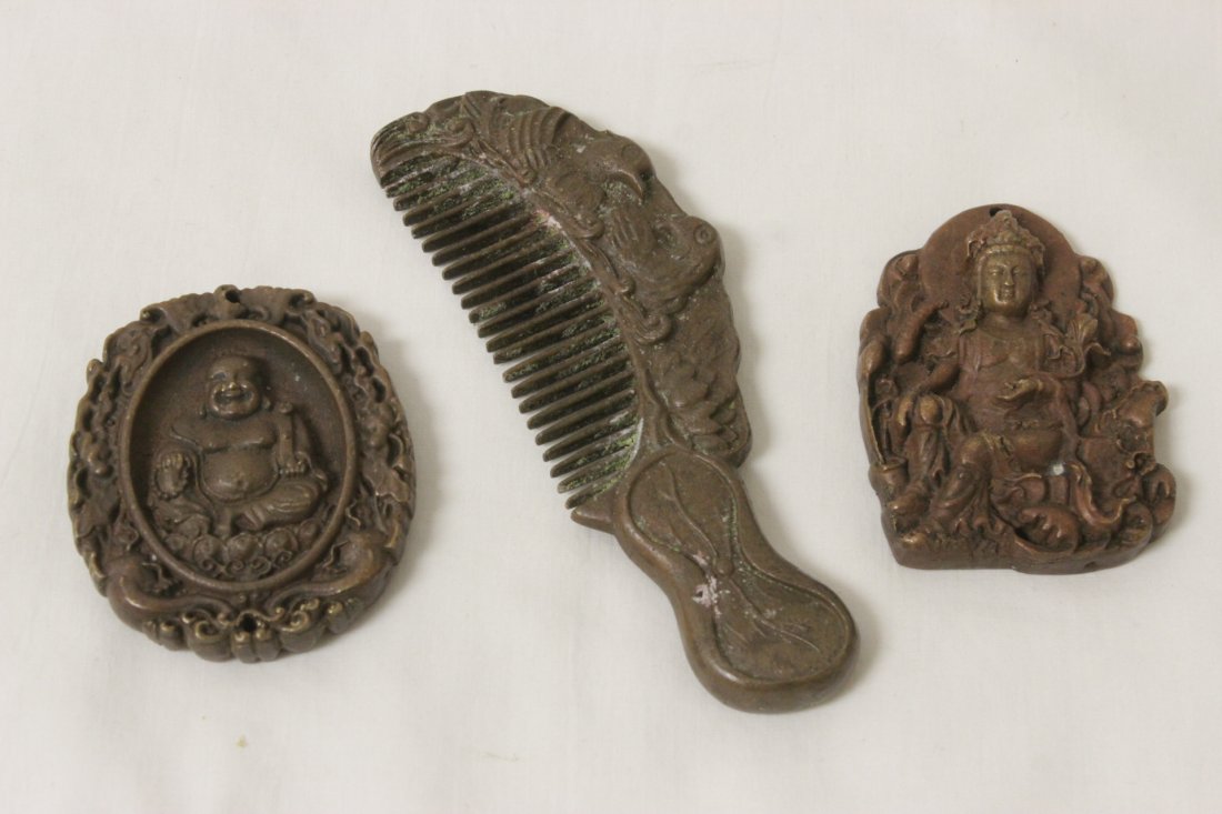 3 bronze pieces; 2 plaques and a comb (1 of 8)