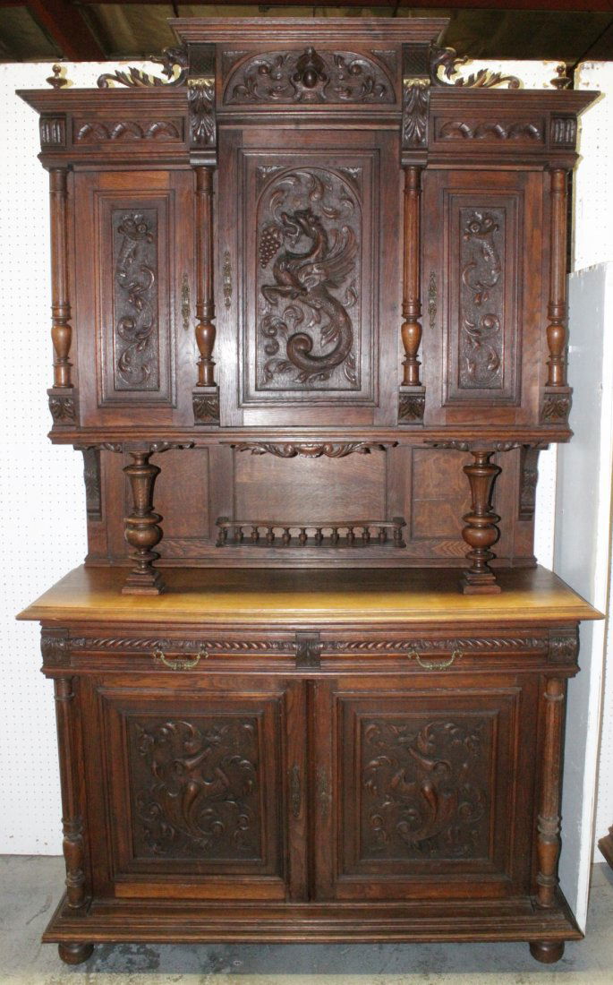 A mid-19th century French oak hunter cabinet (1 of 10)
