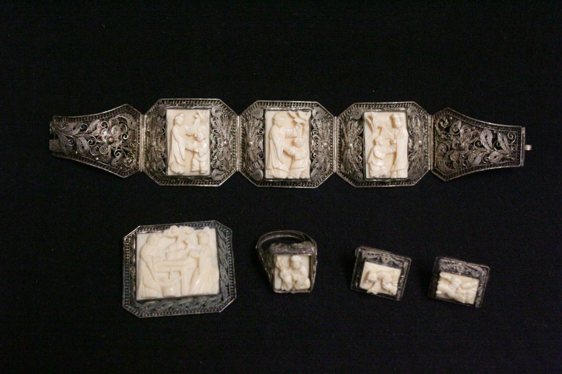 Chinese antique silver and ivory jewelry: Chinese antique silver and ivory jewelry; including bracelet (0.95"x0.62"(3)), ring (0.62"x0.5"), brooch (1"x1.05") and pair earrings (0.5"x0.4" each) , NO INTERNATIONAL SHIPPING OF IVORY