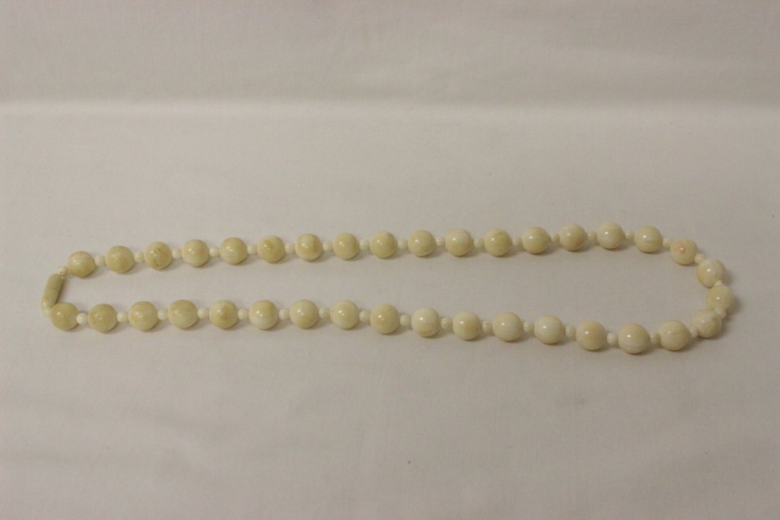 A Chinese antique ivory bead necklace: A Chinese antique finely carved and polished ivory bead (0.49"dia(36)) necklace , NO INTERNATIONAL SHIPPING OF IVORY