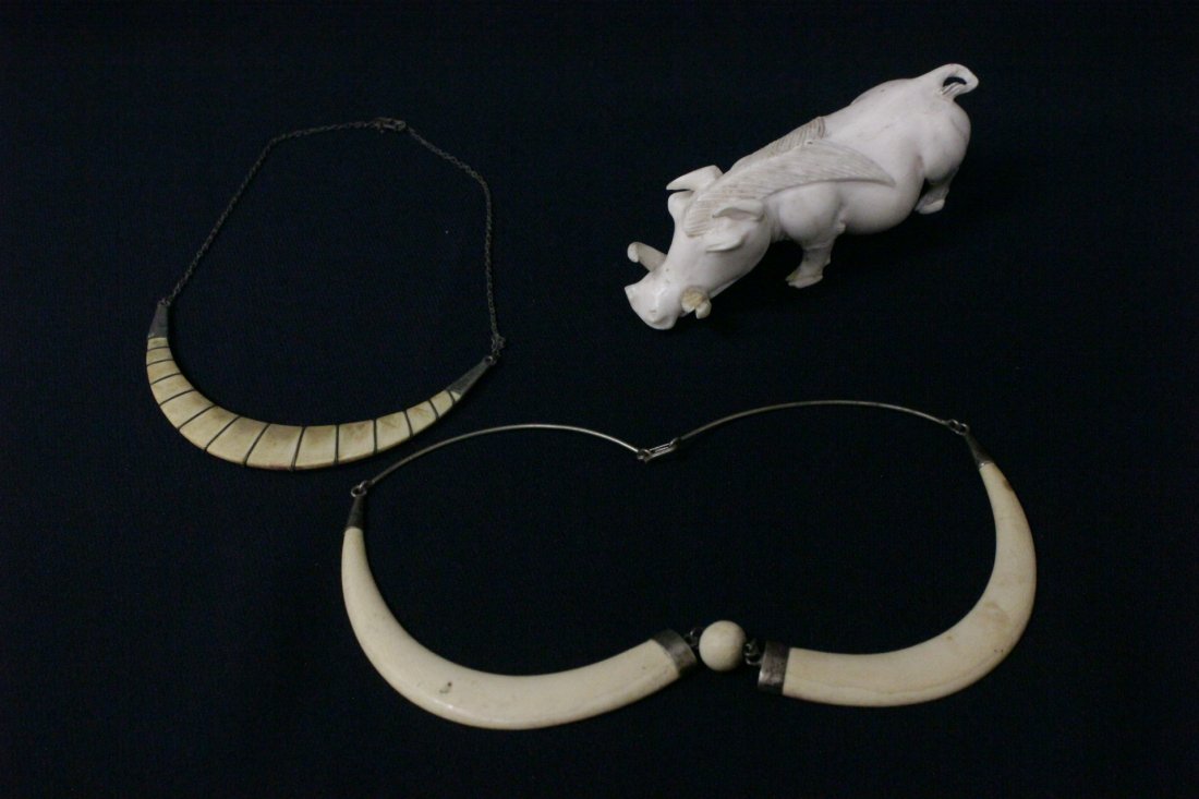 3 ivory carvings; a boar, and 2 necklaces: 3 ivory carvings; a boar (one teeth damage, 4.75"L), and 2 necklaces ((approx. 4.8"L(2), 0.48"dia)), approx. 5.75"L) , NO INTERNATIONAL SHIPPING OF IVORY
