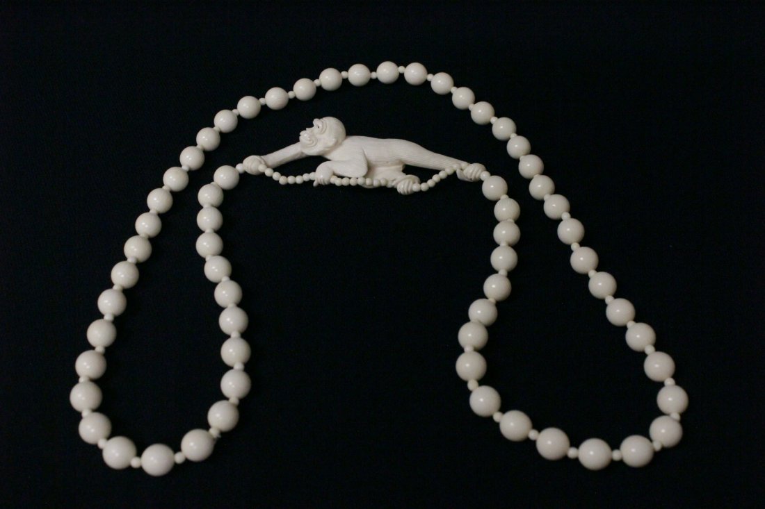 Unusual ivory carving w/ an ivory necklace (1 of 10)