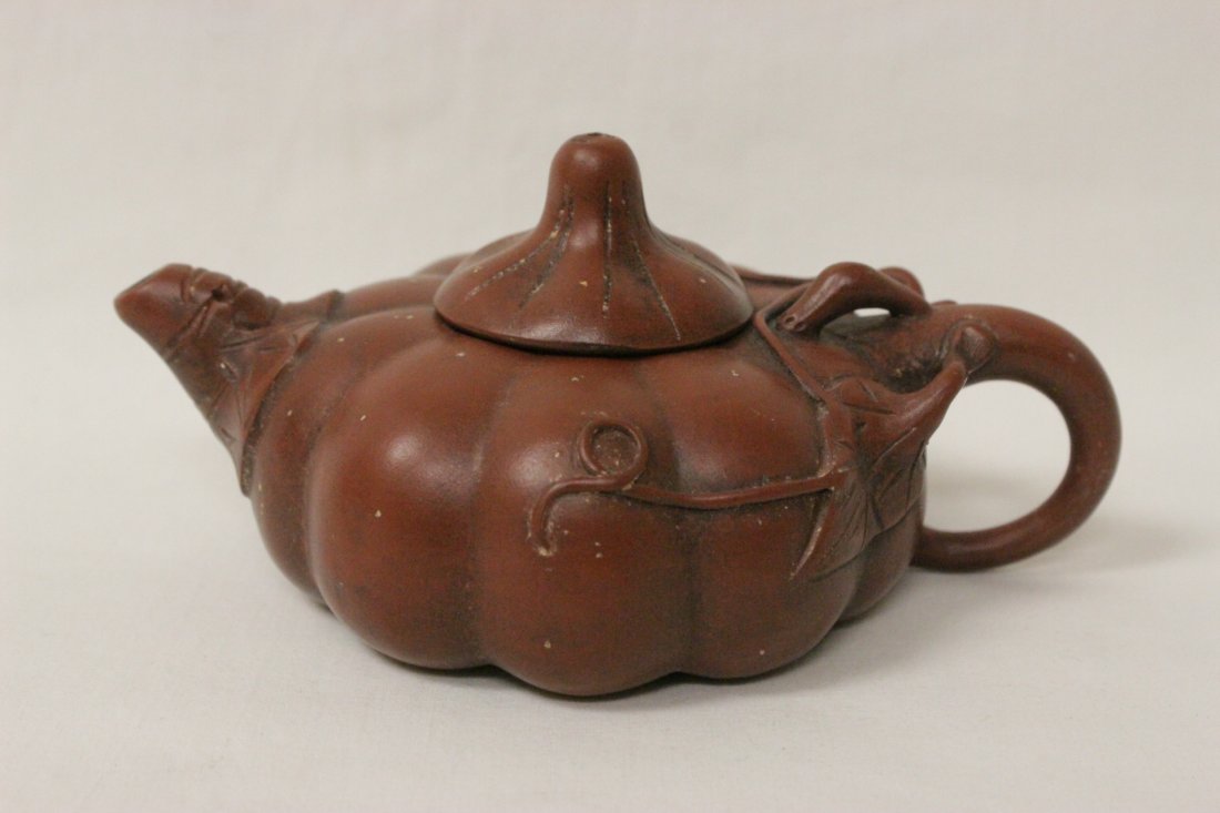 Chinese vintage Yixing clay teapot: Chinese vintage Yixing clay teapot with form of melon, 2.5"Hx5.5"x3.6"