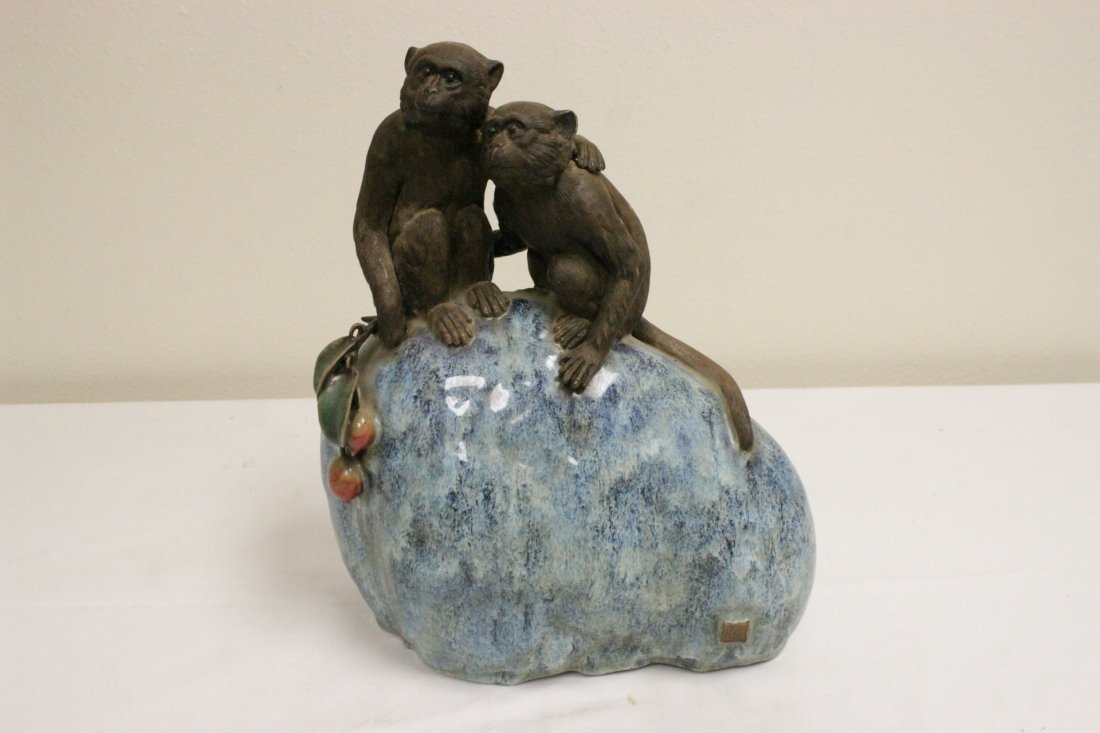Chinese porcelain sculpture: Chinese porcelain sculpture depicting 2 monkeys seating on rock, 12.75"Hx11"x6.25"