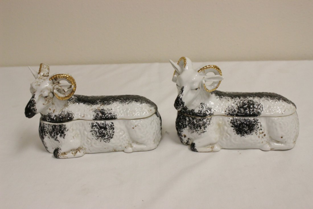 Pair Russian antique Czarist porcelain boxes: Pair Russian antique Czarist porcelain boxes in ram motif, 4.6"Hx6.6"x3.25" each