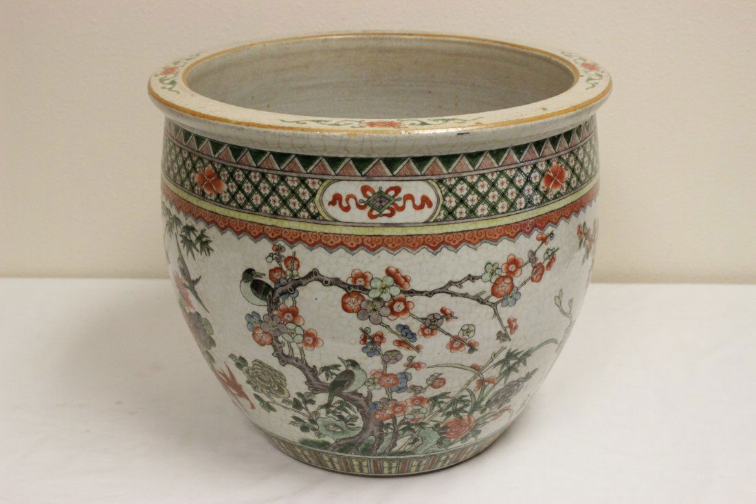 Chinese antique famille rose porcelain planter: A beautiful Chinese antique famille rose porcelain planter painted with flowers and birds, possible Guangxu period, 13.5"Hx15.75"dia