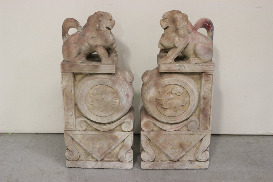 Pair stone carved fulion on pedestal (1 of 10)
