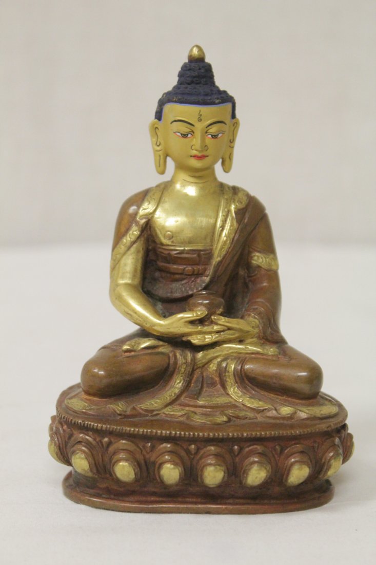 A small gilt bronze seated Buddha (1 of 10)