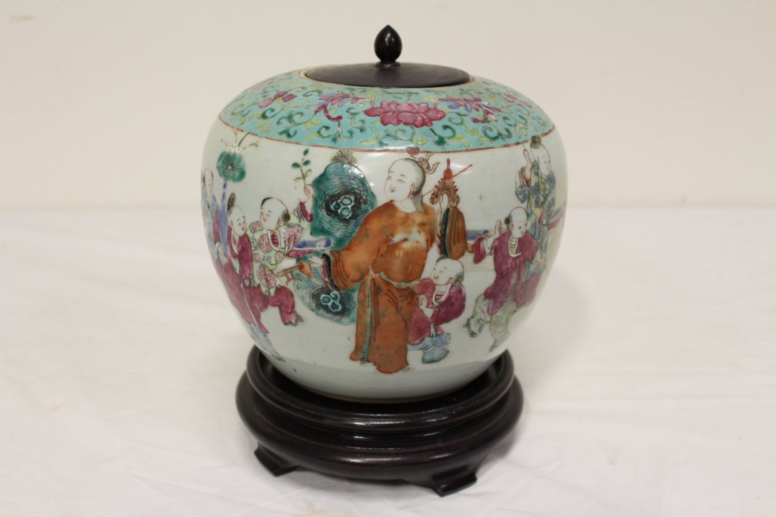 Chinese antique famille rose porcelain jar: Chinese antique famille rose porcelain jar painted with children playing scene (replacement wood cover), 8.4"Hx8.75"dia
