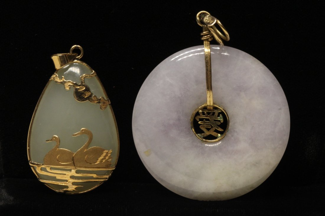 A celadon jade pendant, and a jadeite disc (1 of 10)