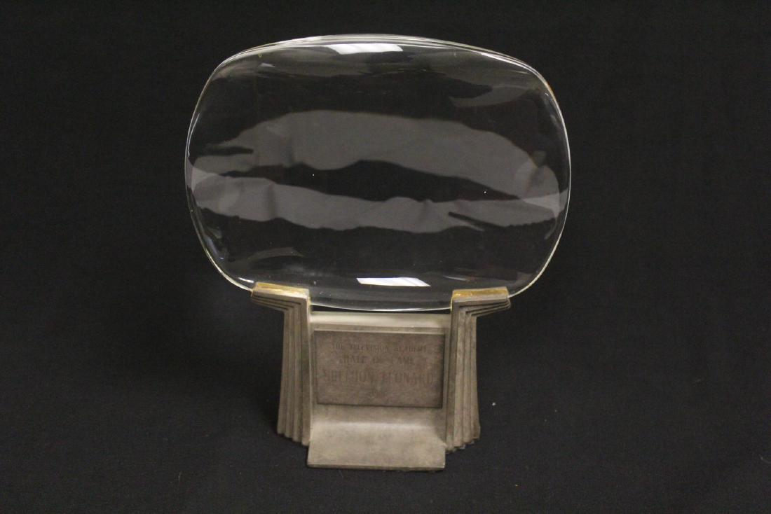 A crystal & bronze trophy for Sheldon Leonard: A crystal and bronze trophy for the television hall of fame Sheldon Leonard, 9.75"x8.5"x3.4"