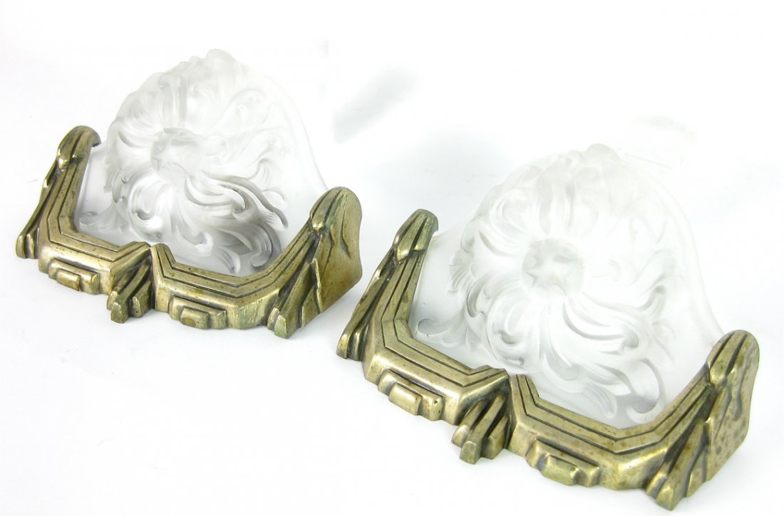 A pair of Art Deco silver-plated wall lights with : A pair of Art Deco silver-plated wall lights with glass panels by Sabino, French, circa 1930 15cm high, 24cm wide