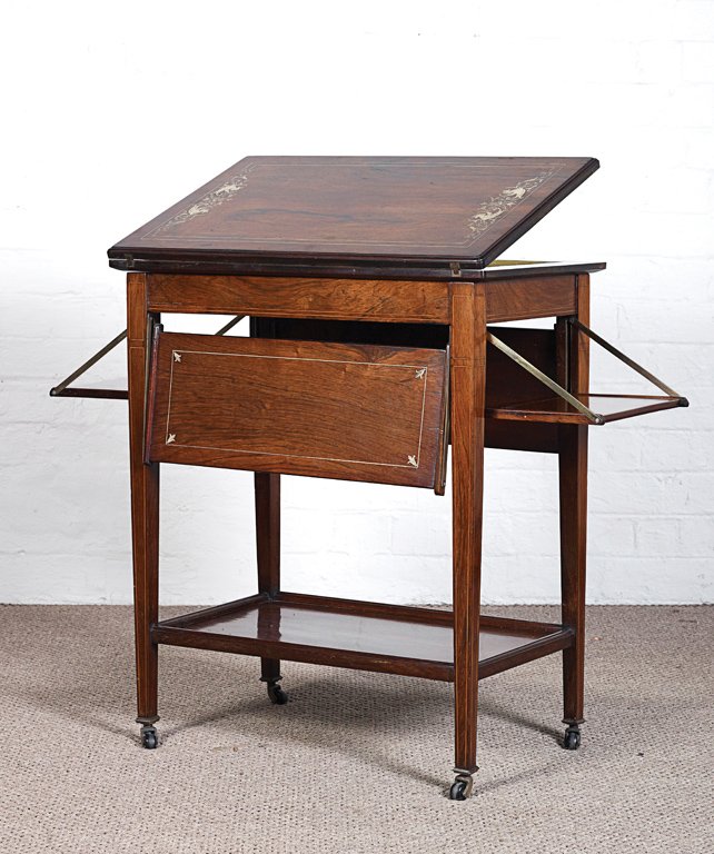 A late Victorian ivory inlaid rosewood games table: A late Victorian ivory inlaid rosewood games table, English, circa 1900 72cm high, 60cm wide, 39cm deep THIS LOT WILL BE SOLD WITHOUT RESERVE