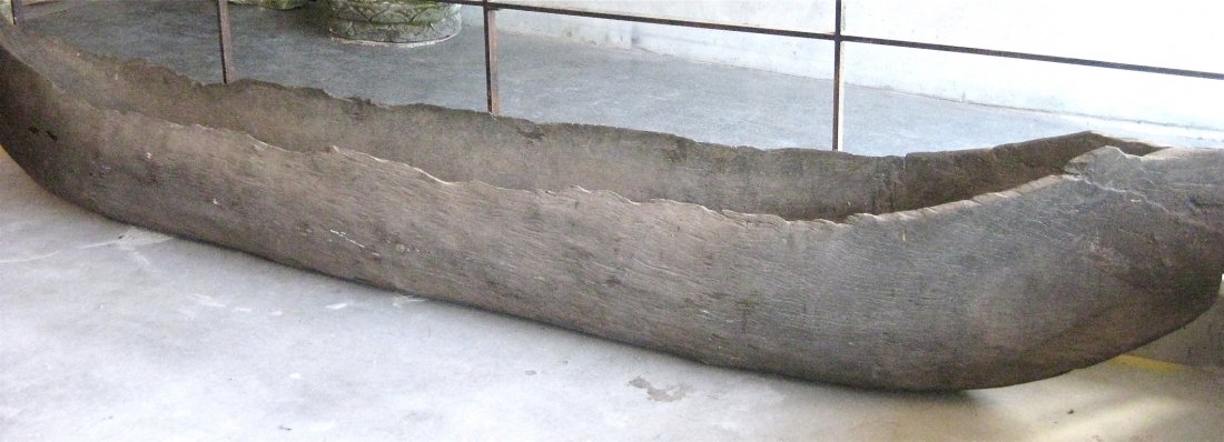 A rare and very large Aboriginal dug-out canoe: A rare and very large Aboriginal dug-out canoe, 20th century 424cm long, 65cm high