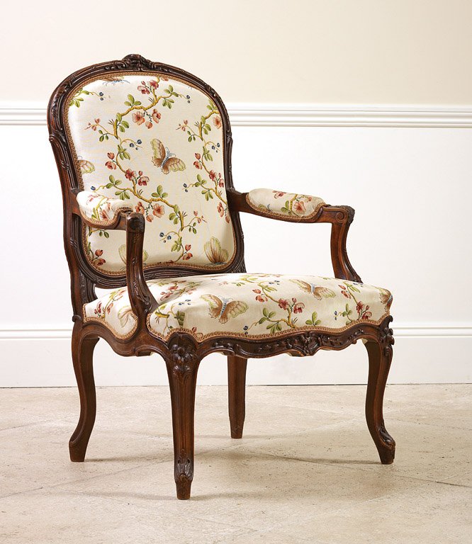 A Louis XV style carved beech fauteuil 98cm high : A Louis XV style carved beech fauteuil 98cm high