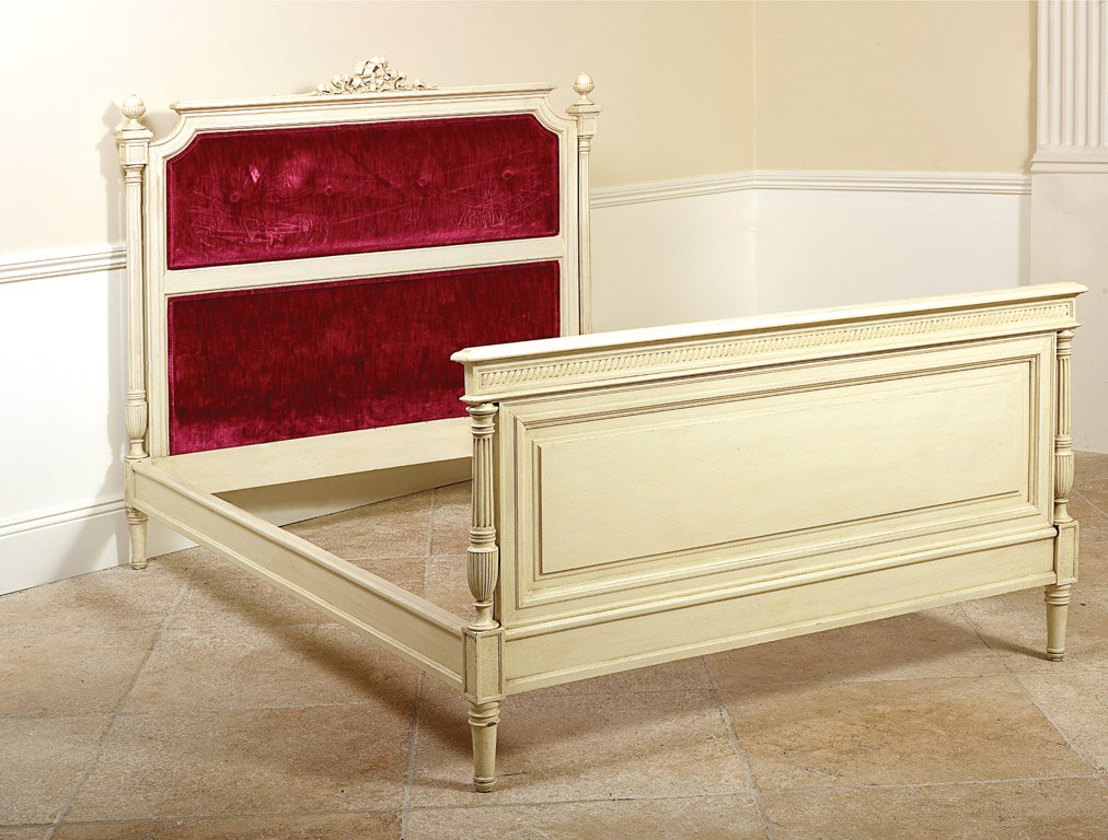 A French cream painted and pink upholstered bed 13: A French cream painted and pink upholstered bed 137cm high, 204cm long, 144cm wide