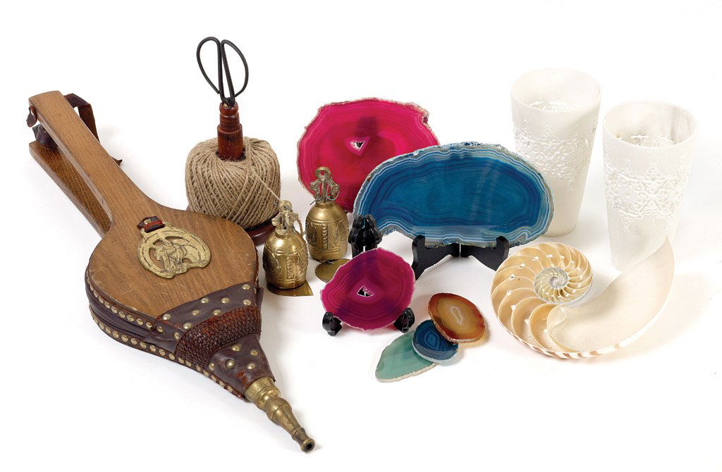 A collection of various objects including a pair o: A collection of various objects including a pair of bellows, gemstones and shells