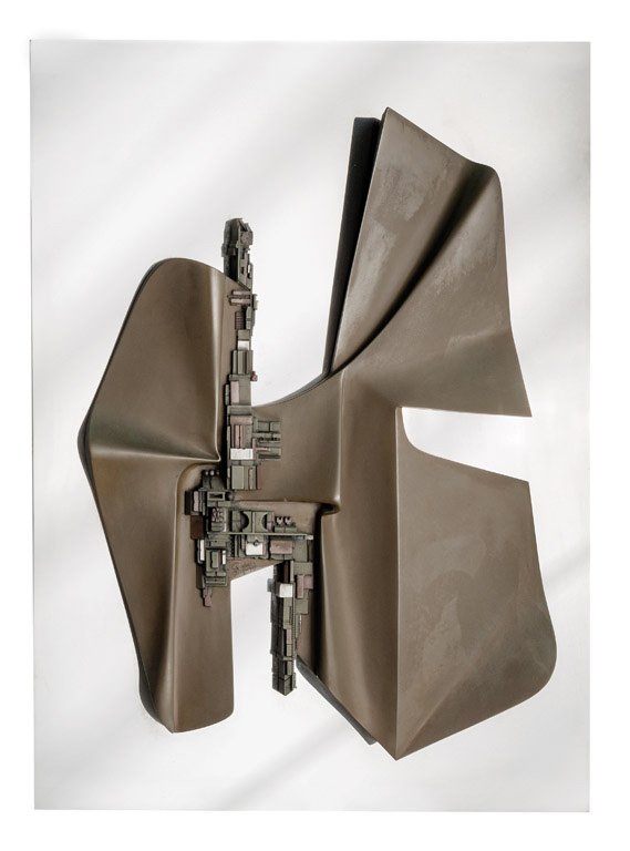 GIOVANNI SCHOEMAN (SOUTH AFRICA, UNITED STATES OF: GIOVANNI SCHOEMAN (SOUTH AFRICA, UNITED STATES OF AMERICA, BORN 1940) Relief Sculpture mixed metal and mirror reputedly from a Seidler House interior the abstract metal form mounted on mirror backing