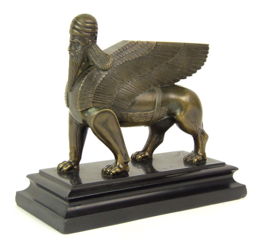 A bronze and black marble Grand Tour model of an: A bronze and black marble Grand Tour model of an Assyrian winged lion with human head, French, 19th century 23cm high, 26cm wide