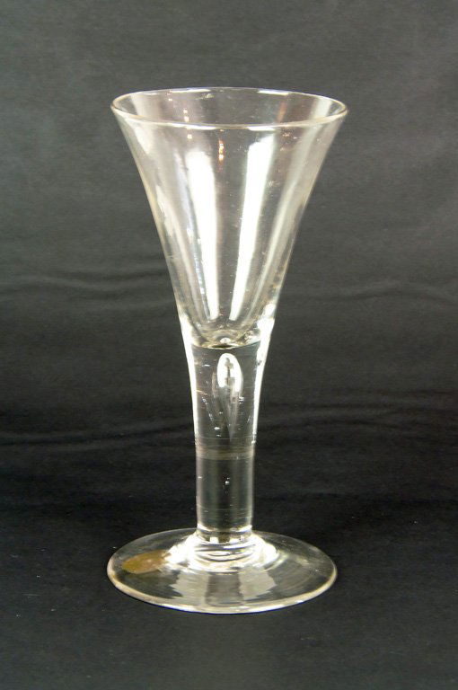 1286 A large wine glass with air bubble stem and conic