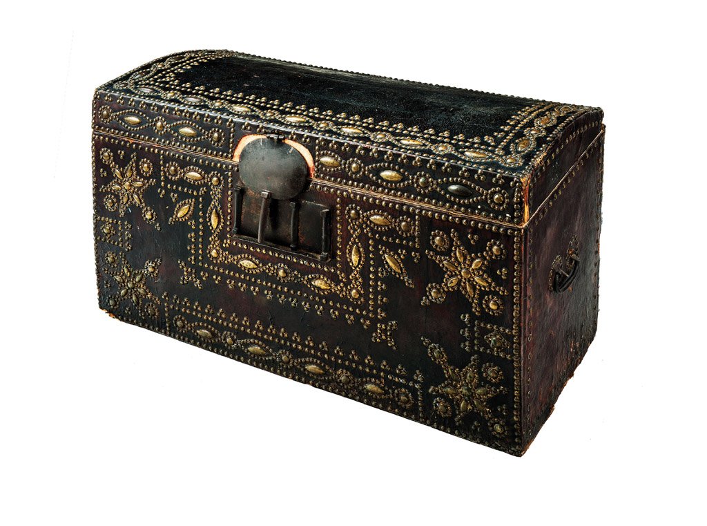 A fine leather and brass studded travelling trunk, Span: A fine leather and brass studded travelling trunk, Spanish, 18th century 60 x 110cm