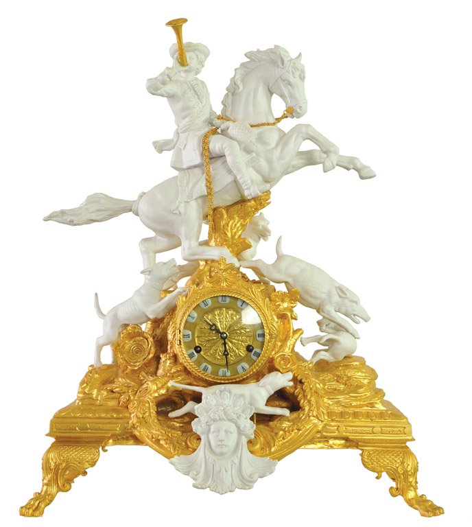A gilt metal and Parian porcelain hunting scene clock : A gilt metal and Parian porcelain hunting scene clock 70cm high, 55cm wide
