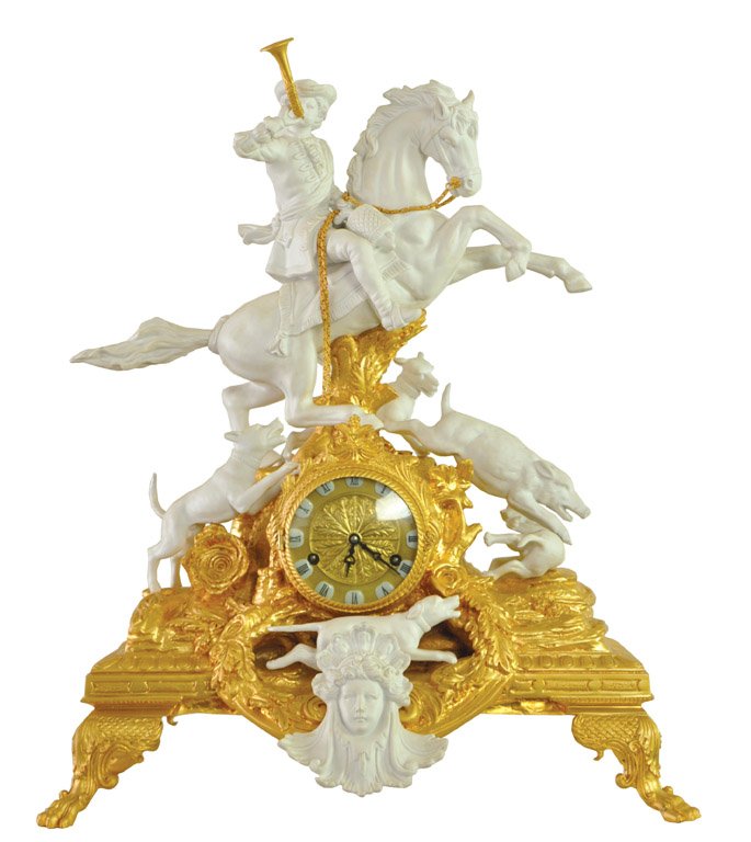 A gilt metal and Parian porcelain hunting scene clock : A gilt metal and Parian porcelain hunting scene clock 70cm high, 55cm wide