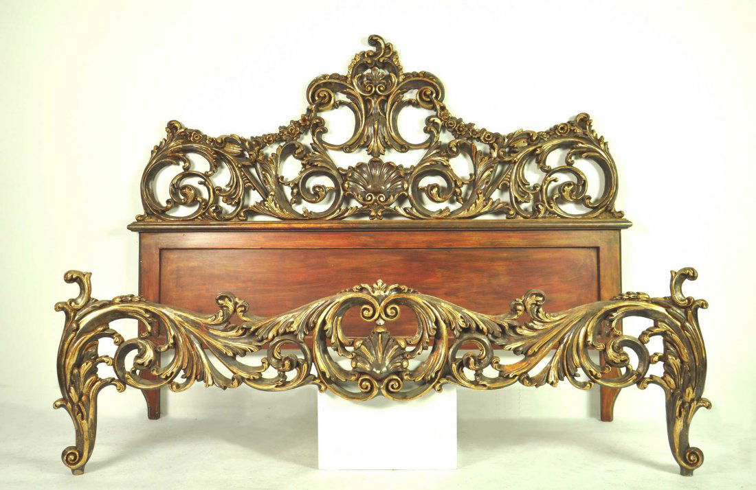 A silvered and gilt carved bed in the Italianate style : A silvered and gilt carved bed in the Italianate style headboard 138cm high, 170cm wide to fit mattress approximately 164cm wide