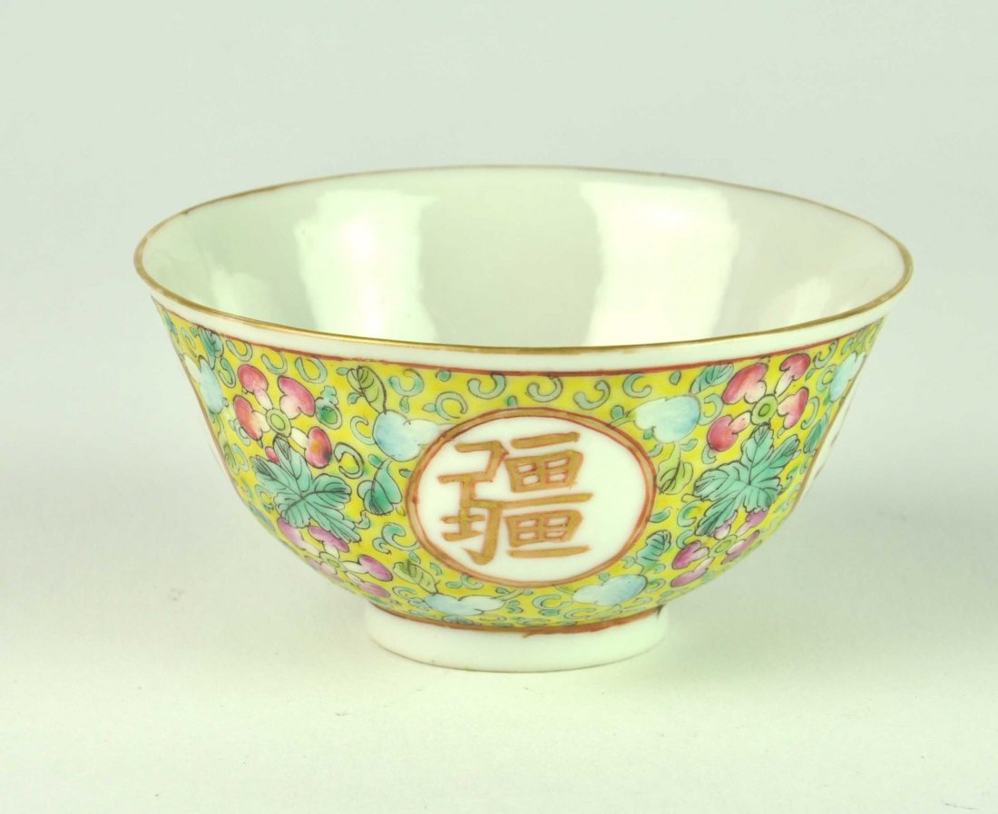A Chinese fencai enamel small bowl, Republican period, : A Chinese fencai enamel small bowl, Republican period, early 20th century the outside with four iron-red shou medallions against a fruiting scroll on a yellow ground, a shou medallion with five bats i