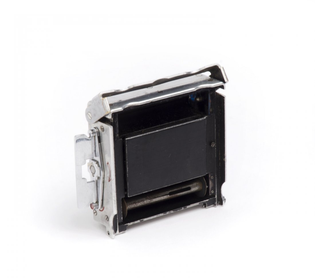 COMPASS: Compass roll-back, c1937, made in Switzerland: COMPASS: Compass roll-back, c1937, made in Switzerland by LeCoultre; takes unperforated 35mm film on special small spools.
