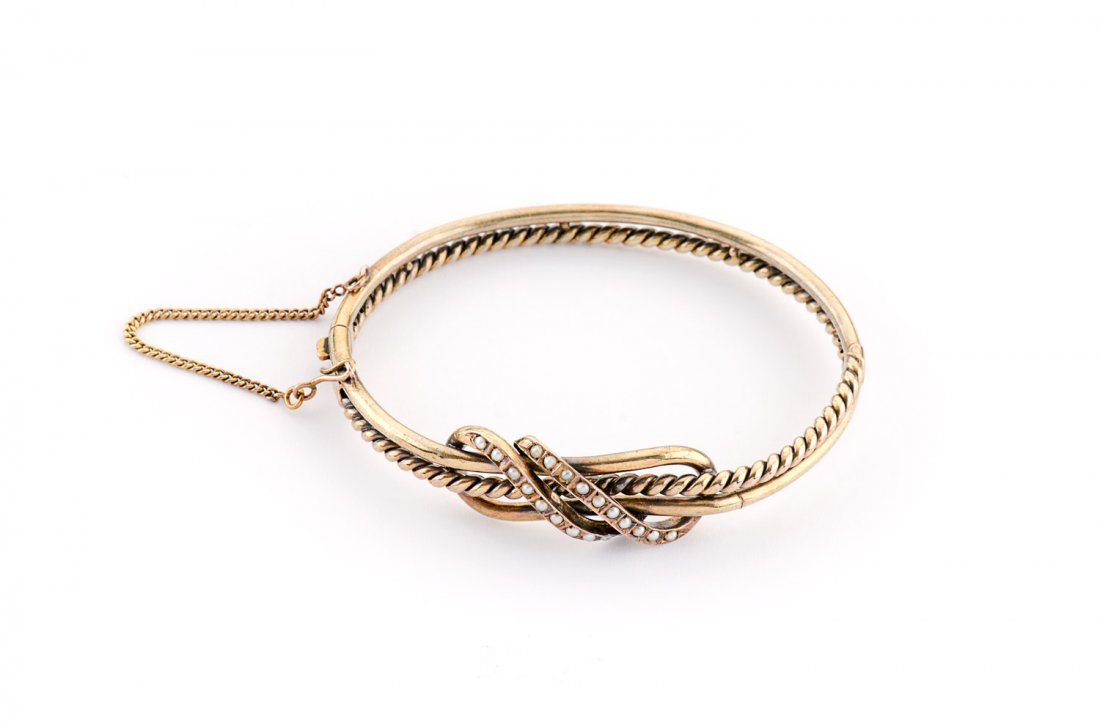 EDWARDIAN BANGLE: 14ct gold and seed pearl. 11 grams.: EDWARDIAN BANGLE: 14ct gold and seed pearl. 11 grams.