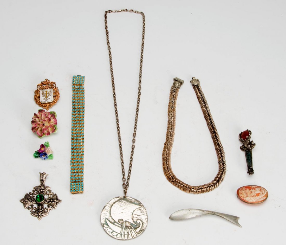 Collection of jewellery including gold wedding band,: Collection of jewellery including gold wedding band, New Zealand greenstone and gold brooch, gold and shark tooth necklace, pocket compass, watch, etc.