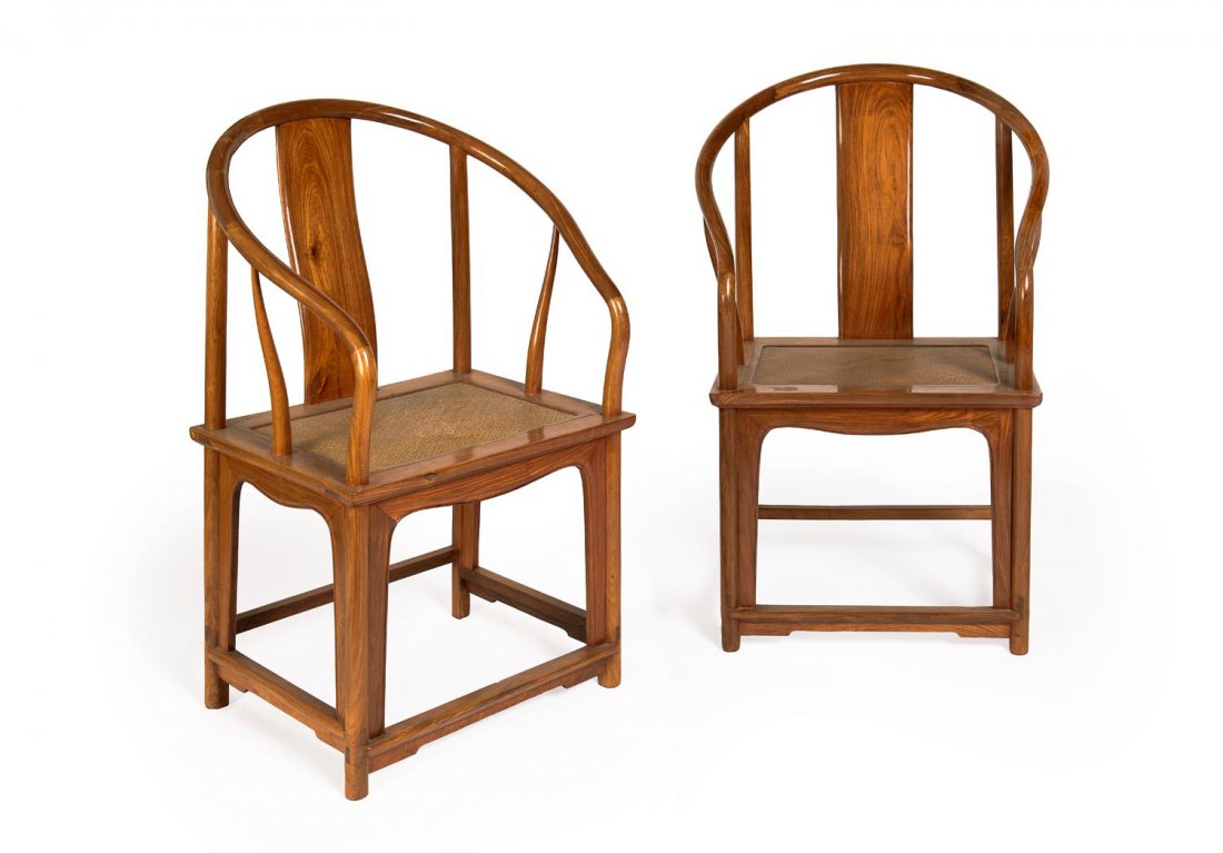 Pair of Chinese rosewood thrown chairs with rattan: Pair of Chinese rosewood thrown chairs with rattan seats, 20th century