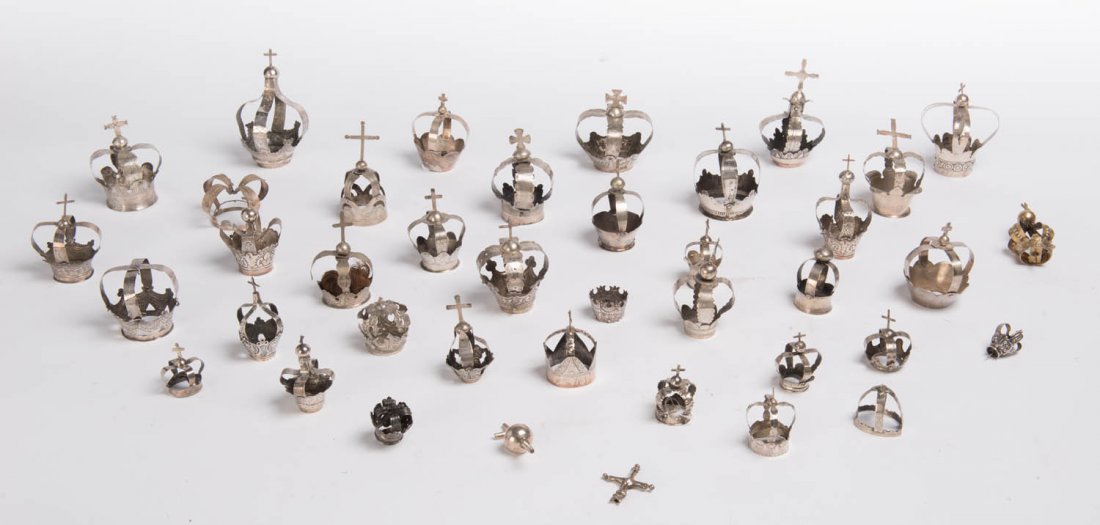 A collection of 38 small silver saint coronitas,: A collection of 38 small silver saint coronitas, Spanish and Italian, 17th and 18th century the largest 14cm high Provenance: Graham Cornall Antiques, Melbourne