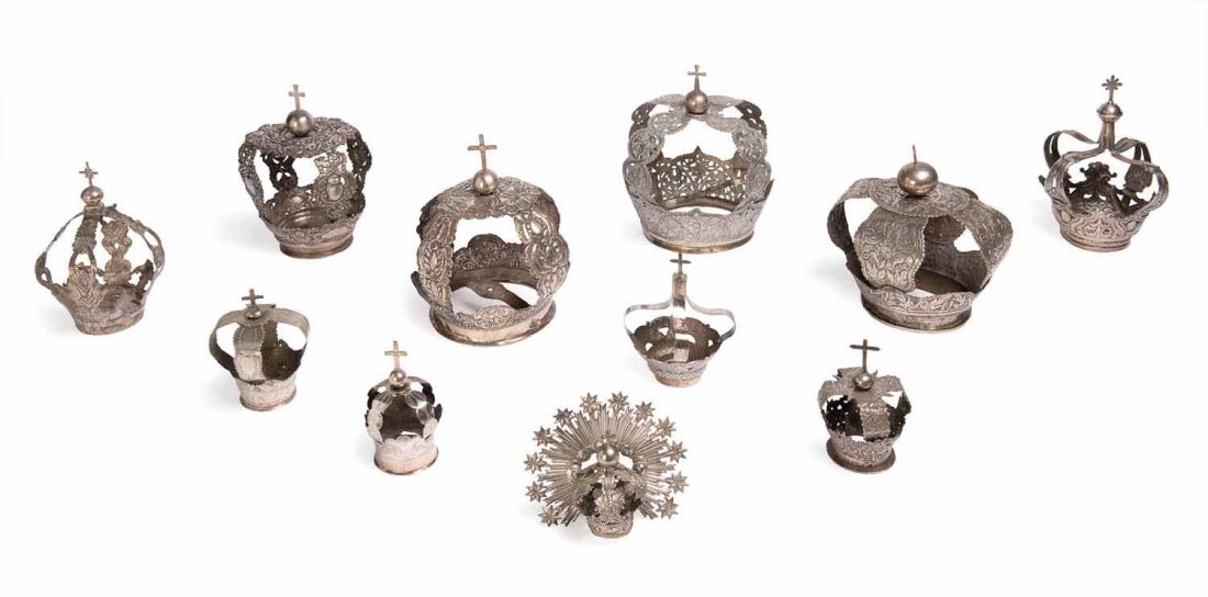 A collection of eleven silver saint coronitas, Spanish: A collection of eleven silver saint coronitas, Spanish and Italian, 17th and 18th century the largest 23cm high Provenance: Graham Cornall Antiques, Melbourne