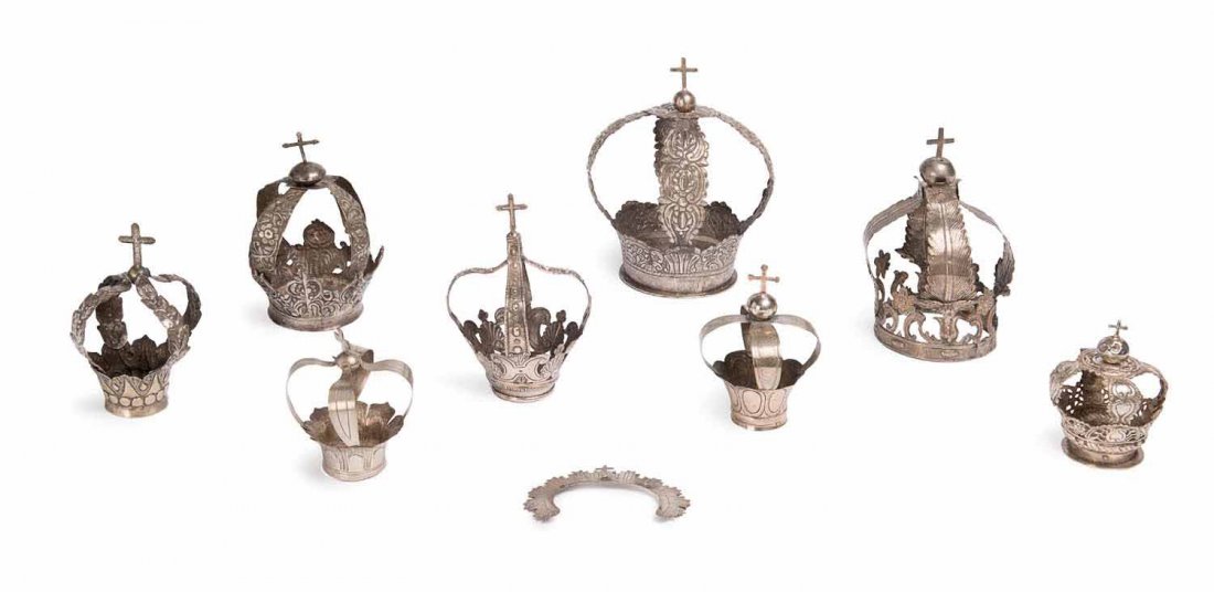 A collection of eight silver saint coronitas, Spanish: A collection of eight silver saint coronitas, Spanish and Italian, 17th and 18th century the largest 21cm high Provenance: Graham Cornall Antiques, Melbourne