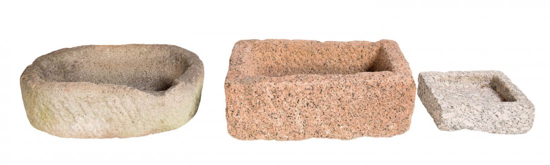 A collection of seven various stone basins, 16th: A collection of seven various stone basins, 16th century and later 26cm high, 77cm wide, 60cm deep