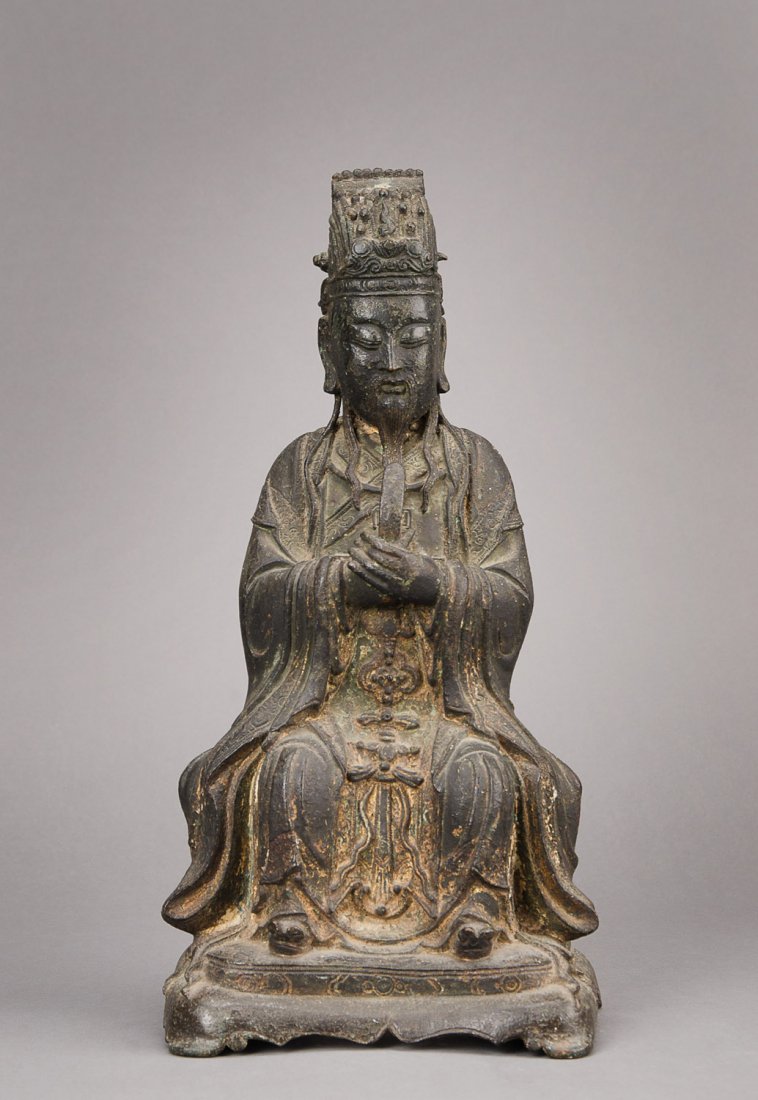 A bronze figure of a 1st Rank Official in formal Court: A bronze figure of a 1st Rank Official in formal Court Dress, Ming Dynasty 38.5cm high x 10.25cm wide