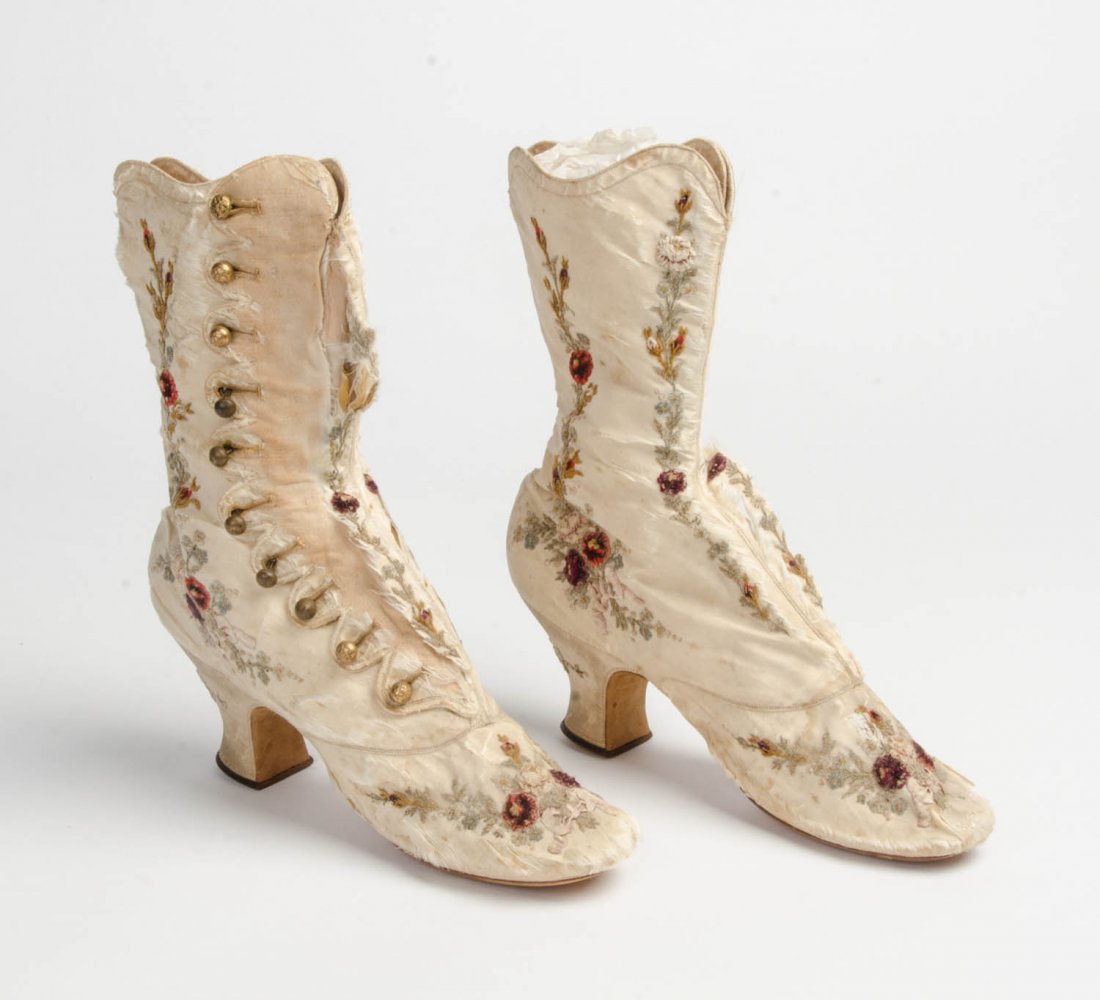 A pair of French antique embroidered button up ladies: A pair of French antique embroidered button up ladies boots.